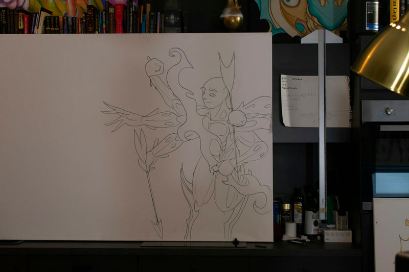Sketch of a fantastical character on a canvas.