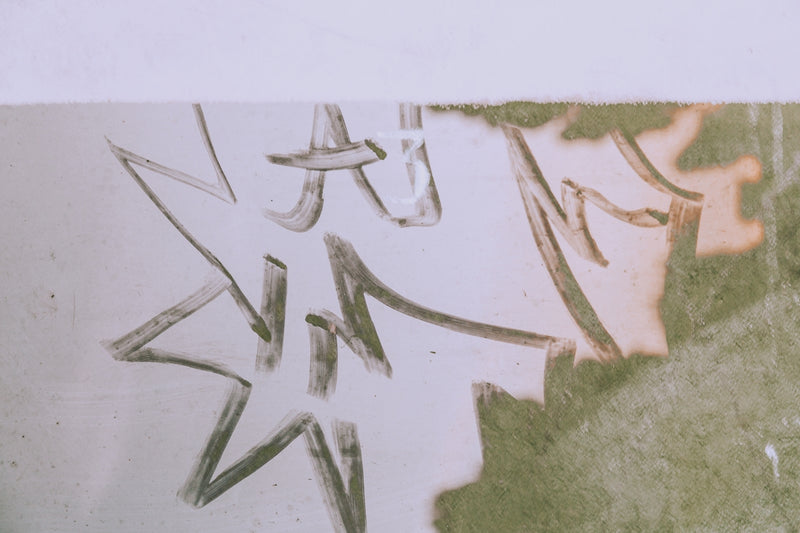 a picture of some writing on a wall