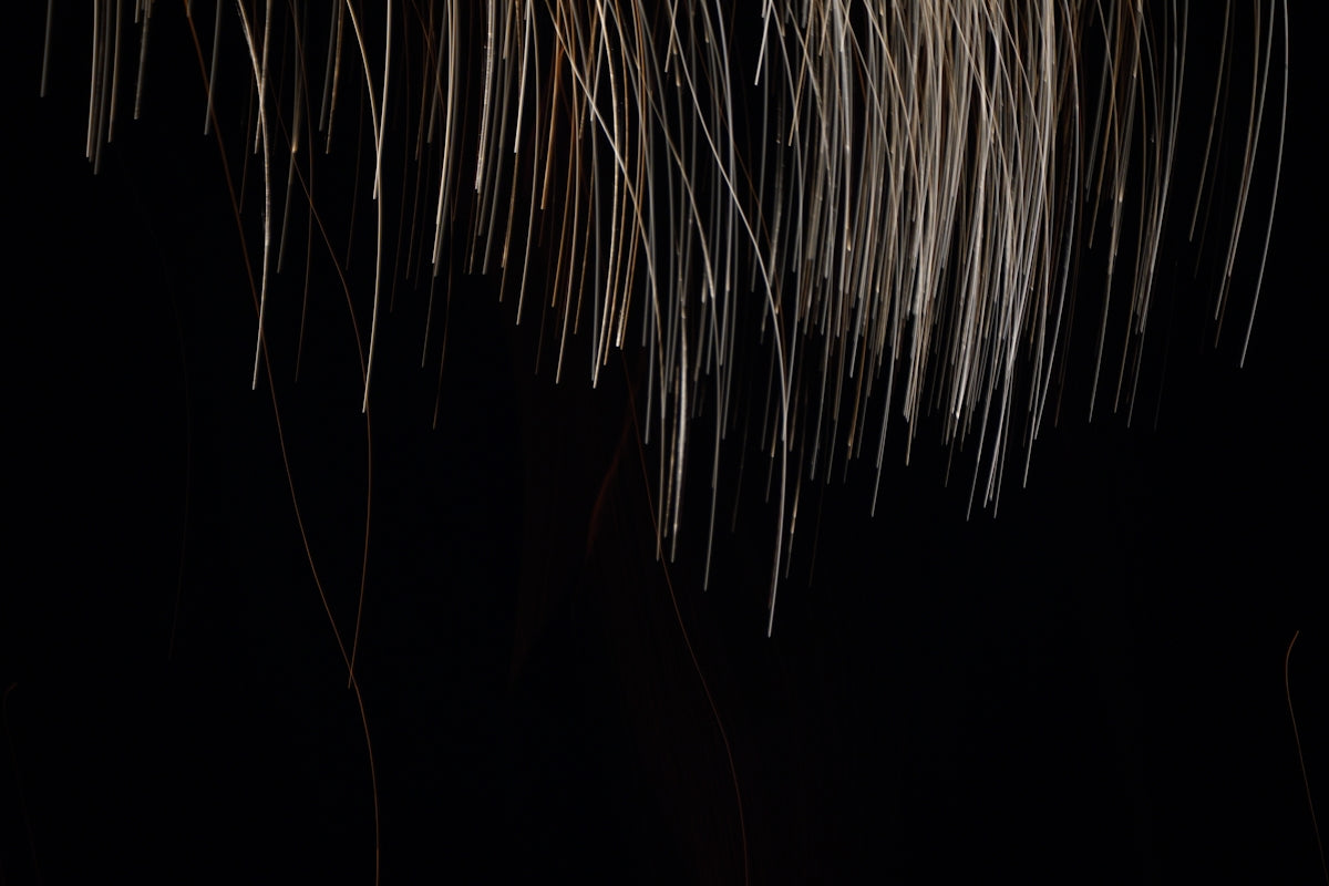 a black background with white and yellow lines