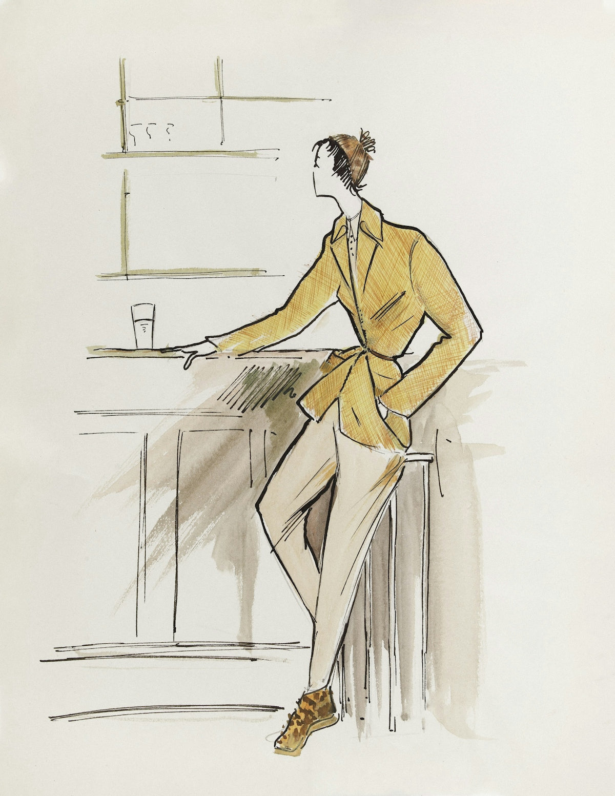 Woman in yellow jacket and beige pants at counter