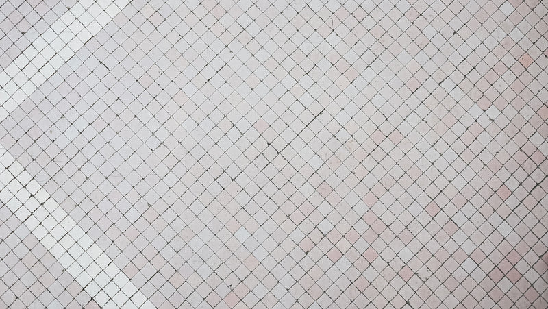 A man with a tennis racquet on a tennis court